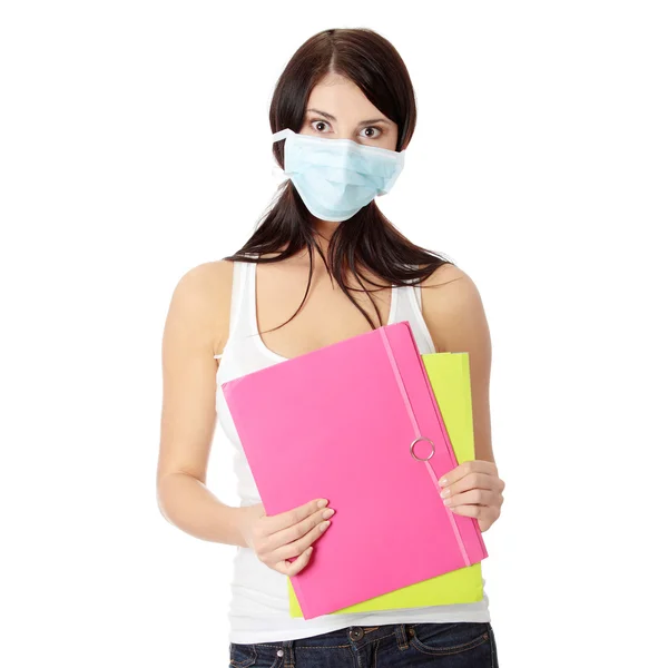 Studentské žena s maskou na tváři — Stock fotografie