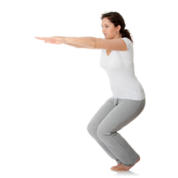 Молодая женщина делает упражнения Стоковая Картинка