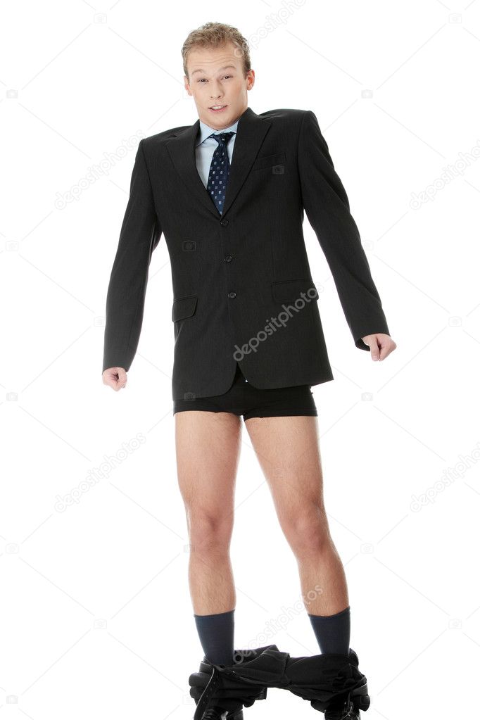 Young businessman caught with pants down.