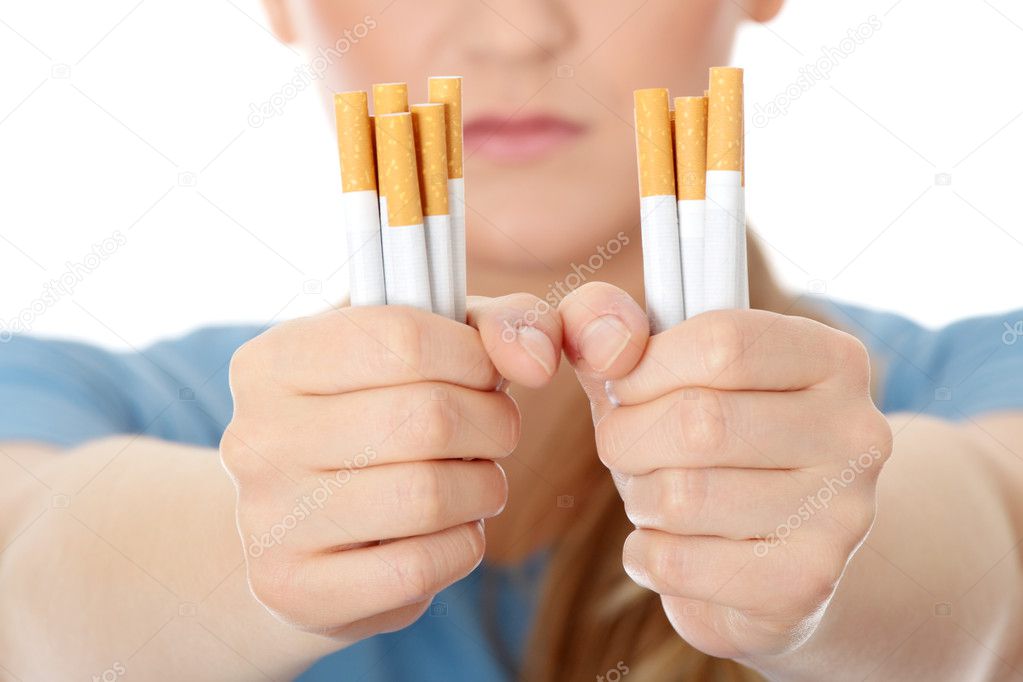 Young caucasian woman quiting smoking