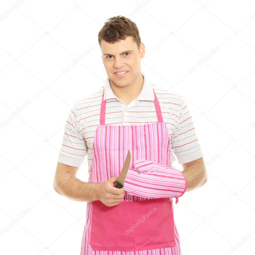 Man wearing a pink kitchen apron
