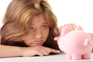 Woman and piggy bank