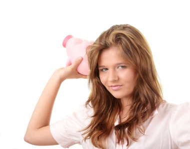 Woman and piggy bank