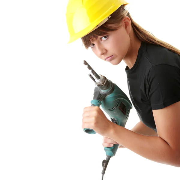 Ung kvinna builder med borraren — Stockfoto