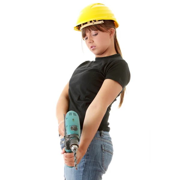 Jeune femme constructeur avec foreur — Photo
