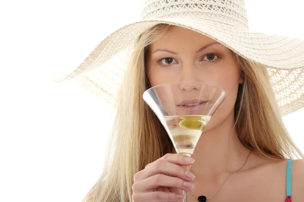 Woman drinking martini with olive — Stock Photo, Image