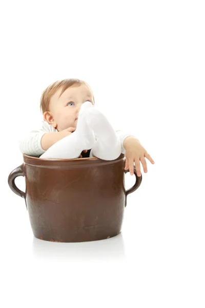 Meisje van de baby met kleine groene pompoen — Stockfoto