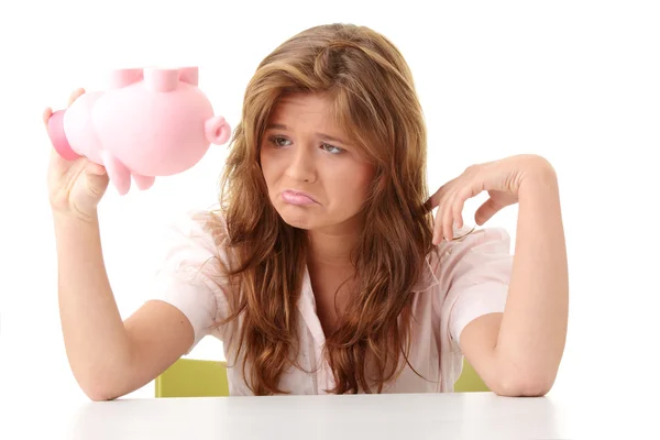 Woman and piggy bank — Stock Photo, Image