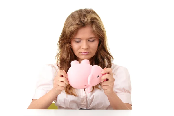 Woman and piggy bank — Stockfoto