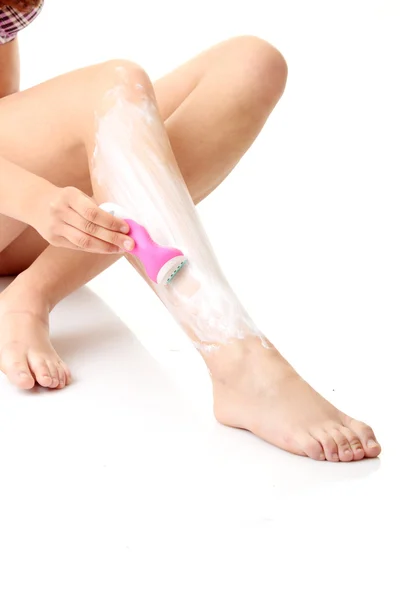 Žena depilating nohy — Stock fotografie