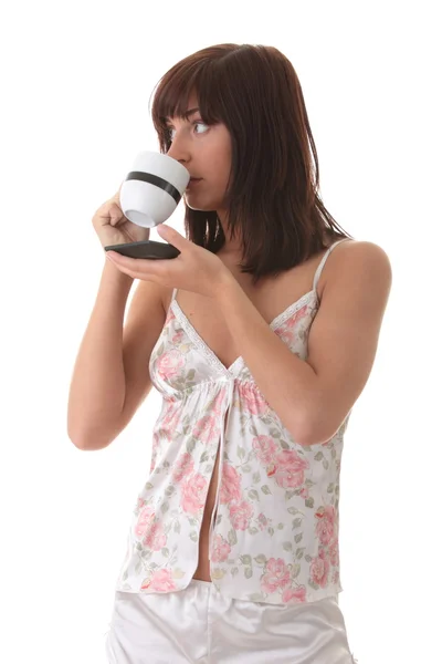 Beautiful young woman is drinking her morning coffee — Stock Photo, Image