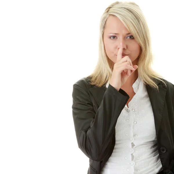 Business woman with finger on lips. — Stock Photo, Image
