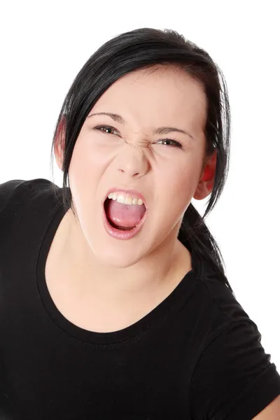 Uma mulher frustrada e zangada está gritando — Fotografia de Stock