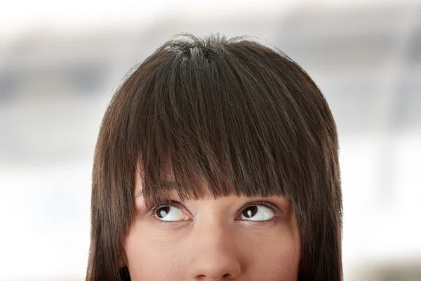 Girl with her eyes looking away left — Stock Photo, Image