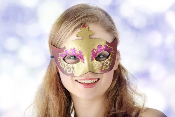 Young woman wearing carnival mask — Stock Photo, Image