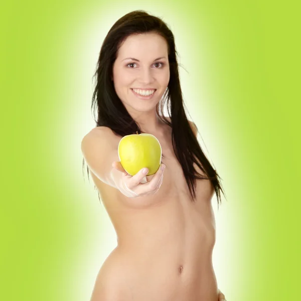Meisje met een sappige groene appel — Stockfoto
