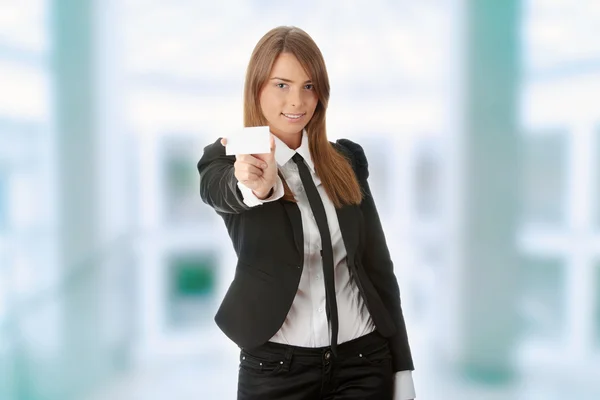Beautiful young business woman with blank business card — Stock Photo, Image