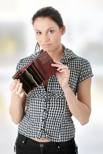 Young caucasian woman with empty wallet - broke
