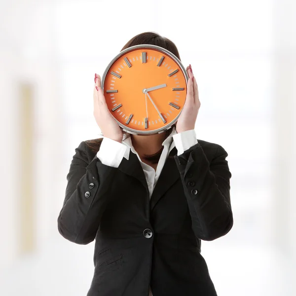 Mujer de negocios con reloj —  Fotos de Stock