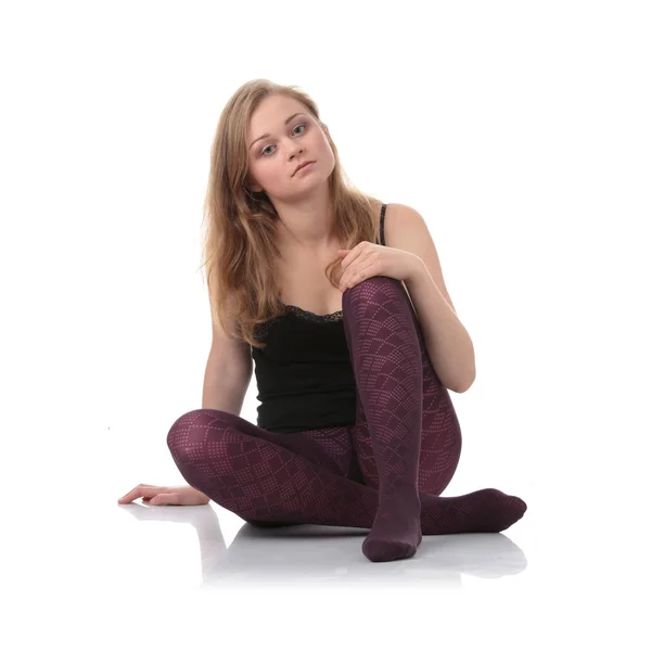 Piękna kobieta nogi na fioletowo — Zdjęcie stockowe