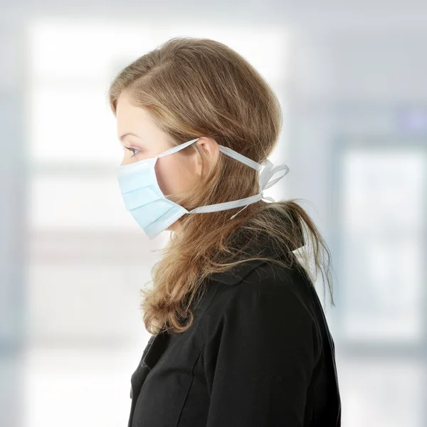 Model ubrany w maskę, aby zapobiec zakażeniu "grypa świń". — Zdjęcie stockowe