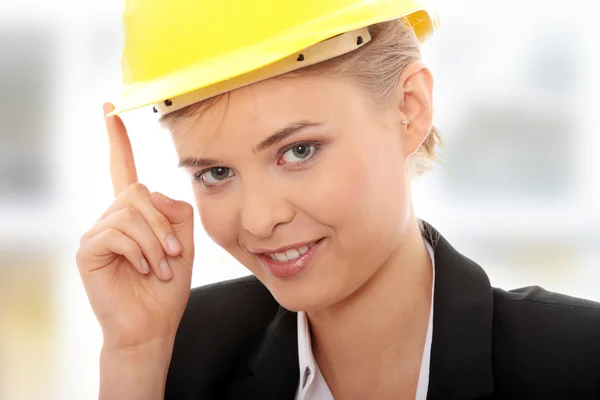 Confident female worker in helmet Stock Photo
