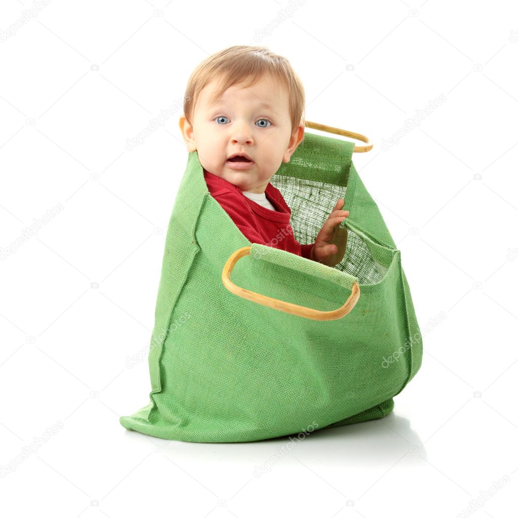 Baby girl in shopping bag