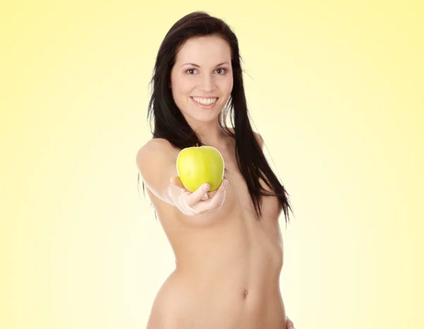 Chica con una manzana jugosa verde —  Fotos de Stock