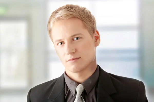 Closeup of a smart handsome business man — Stock Photo, Image