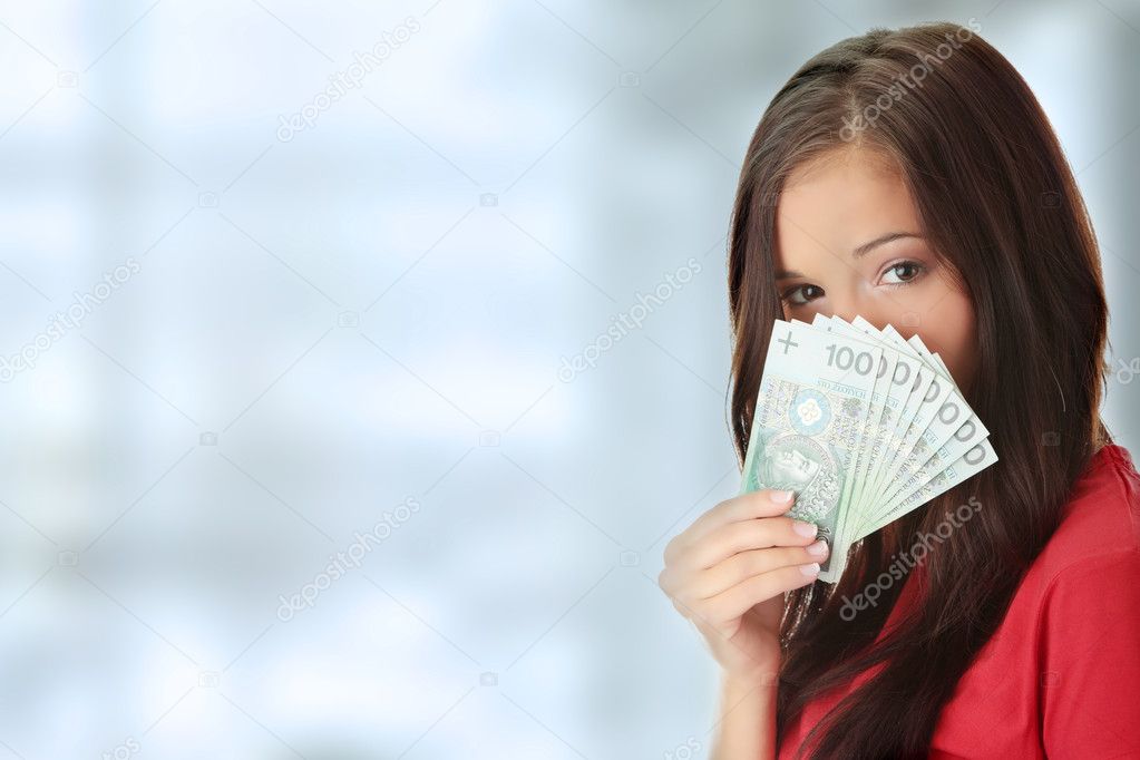 Young lady holding cash