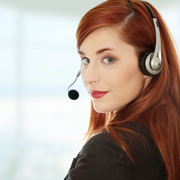 Businesswoman with headset. — Stock Photo, Image