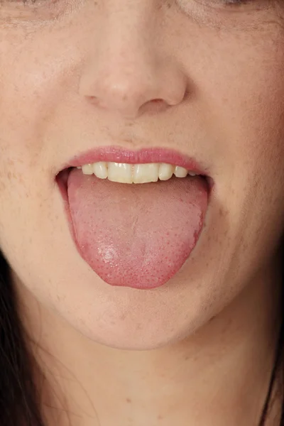 Дівчина показ язик — стокове фото
