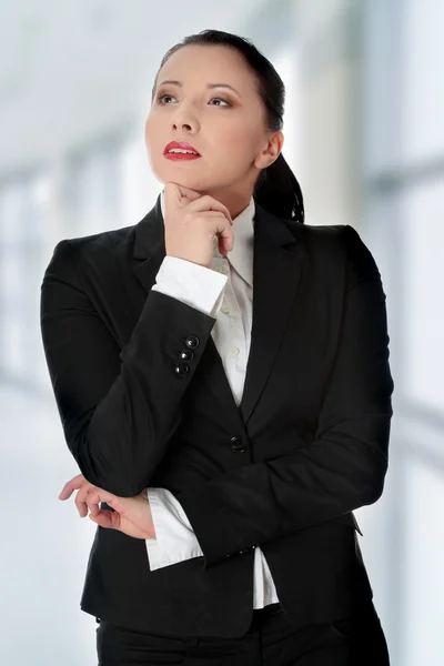 Mujer de negocios reflexiva —  Fotos de Stock