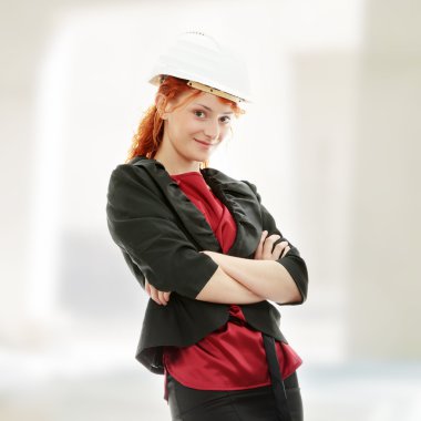 Portrait of confident female worker clipart