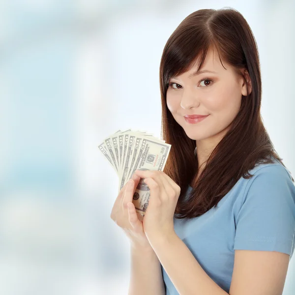 Mulher adolescente com dólares . — Fotografia de Stock
