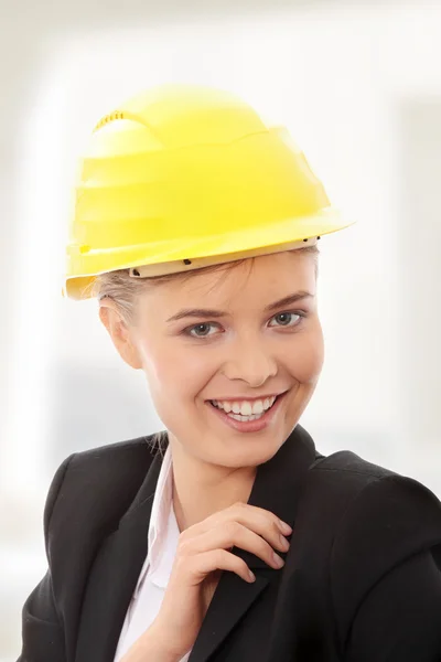 Confident female worker in helmet Stock Image