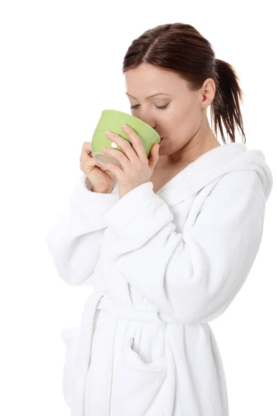 Madura dama en albornoz beber de taza —  Fotos de Stock