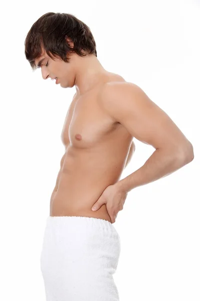 Young man with backache. — Stock Photo, Image