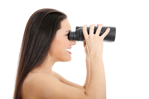 Mujer joven con binocular — Foto de Stock