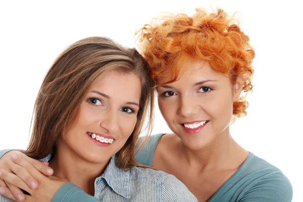 Two pretty girl friends smiling. — Stock Photo, Image