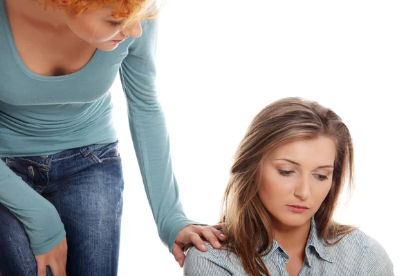 Troubled young girl comforted by her friend — Stock Photo, Image