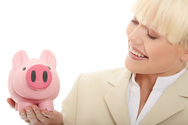 Businesswoman holding piggy bank — Stock Photo, Image
