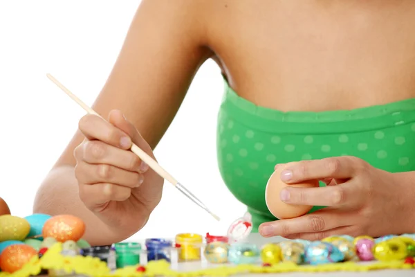 Young girl is making easter decoration — Stock Photo, Image