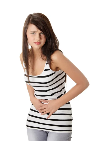 Ung kvinna med magen frågor — Stockfoto