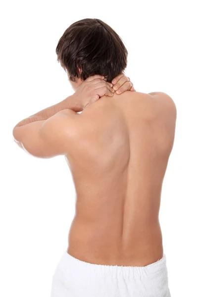 Jovem homem levantando dor nas costas . — Fotografia de Stock