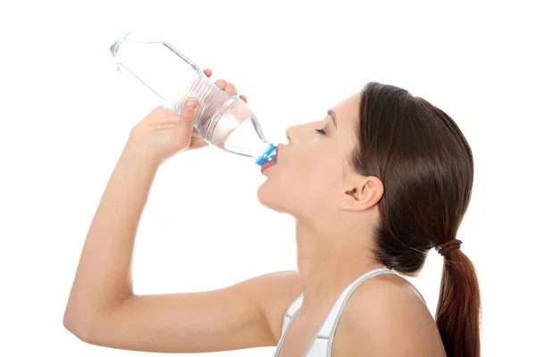 Mulher bonita com garrafa de água mineral — Fotografia de Stock