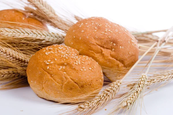 stock image Fresh bread with ears of wheat