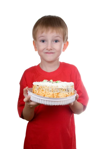 Счастливый мальчик с тортом — стоковое фото