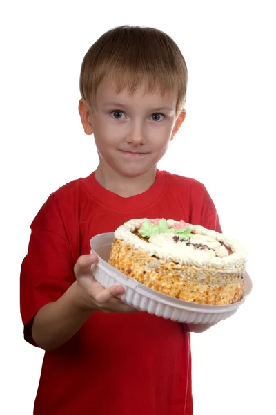 Ευτυχισμένο αγόρι με ένα κέικ — Φωτογραφία Αρχείου