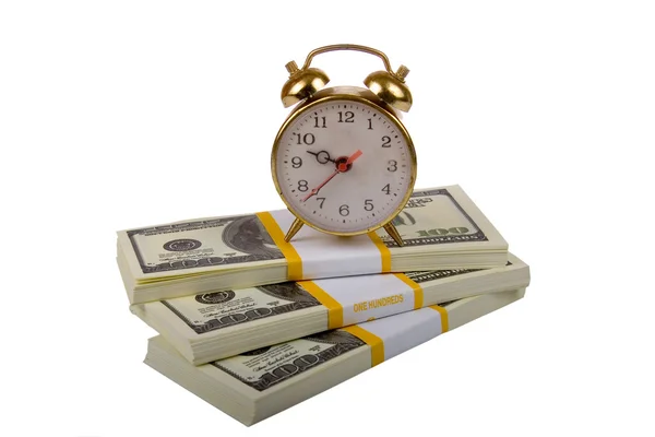 Alarm clock on stack of dollar — Stock Photo, Image